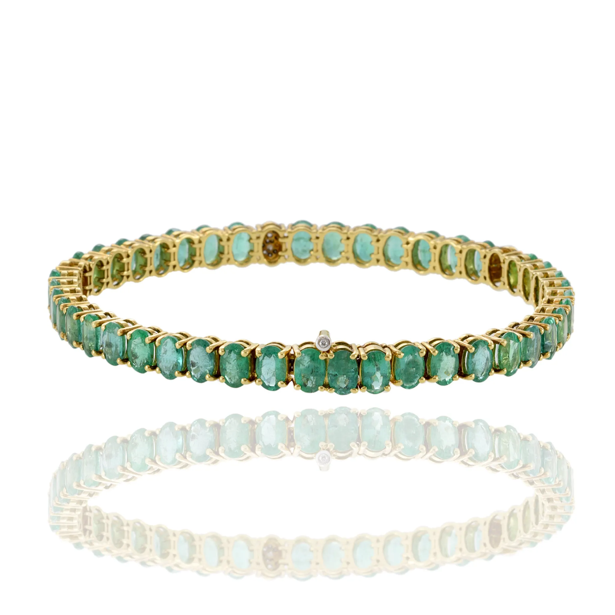 18KT Yellow Gold Diamond And Emerald Bracelet