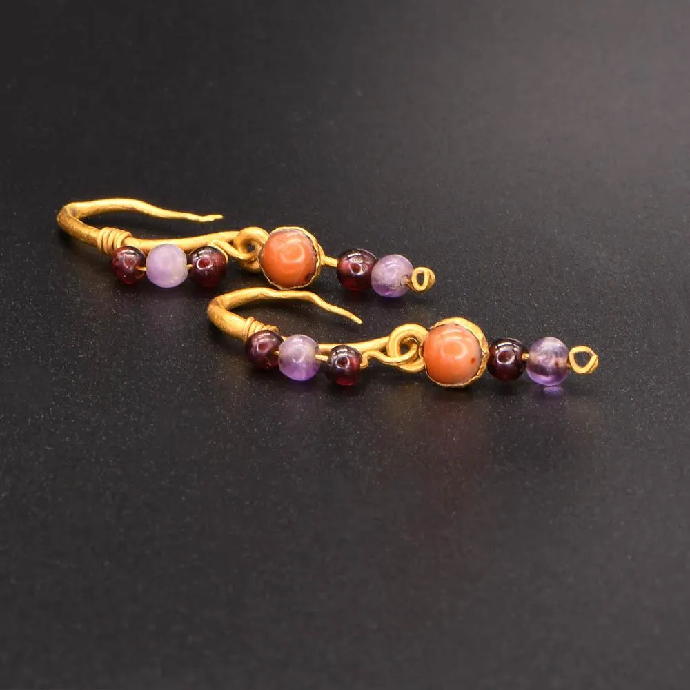 A Pair of Roman Gold, Garnet, Coral and Amethyst Earrings, ca. 1st century CE