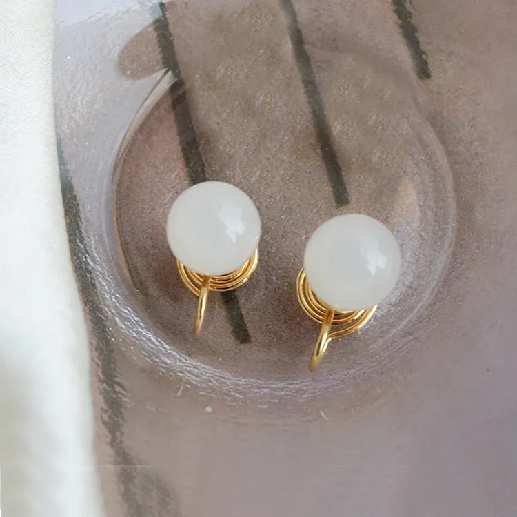 Elegant Natural Hotan Jade Mosquito-Repellent Earrings with Sterling Silver Needle