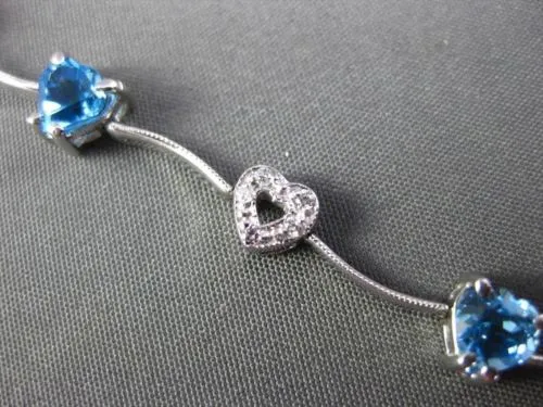 ESTATE LONG 3.80CTW DIAMOND & AAA BLUE TOPAZ 14KT WHITE GOLD HEART BRACELET