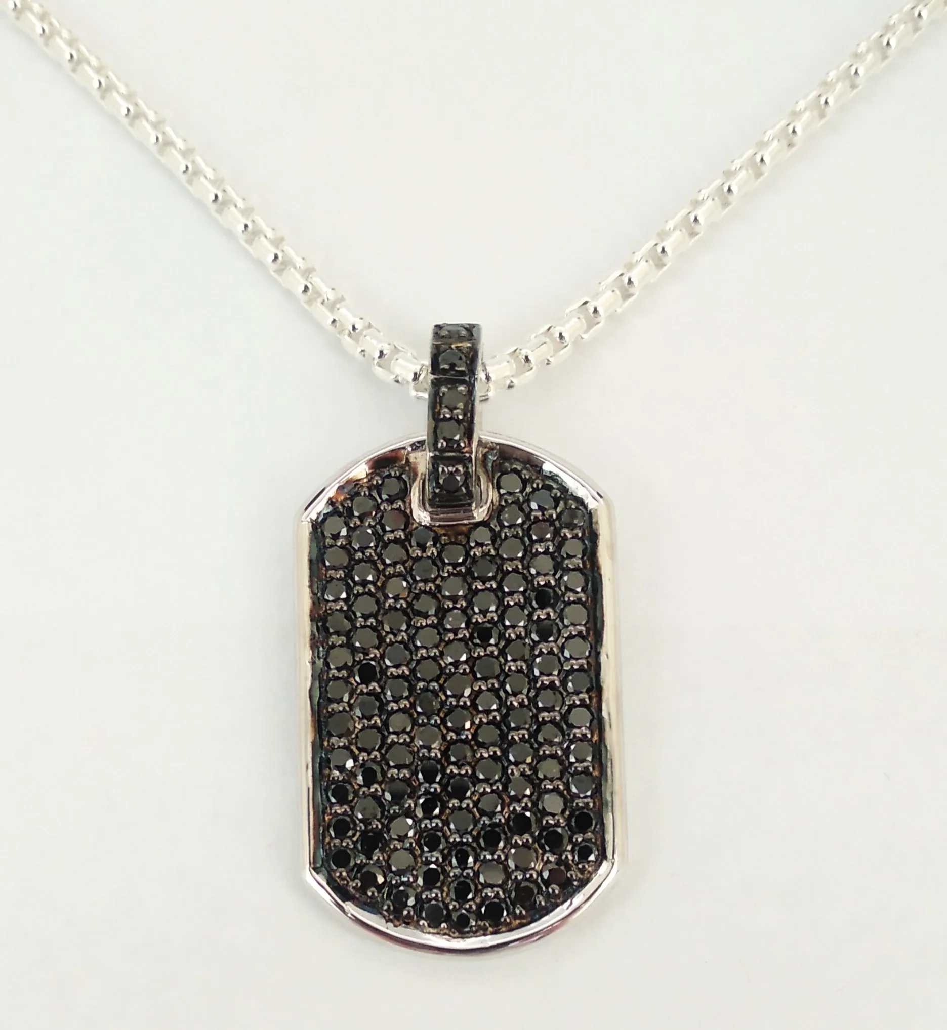 STREAMLINE TAG WITH PAVÉ BLACK DIAMONDS SIL-RNG-06